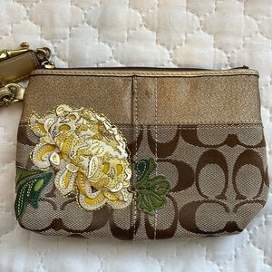 Embroidered Floral Coach clutch